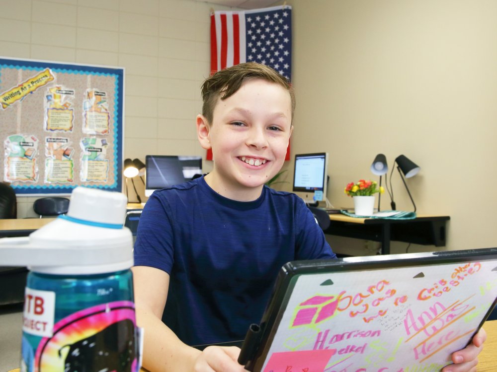 OGMS student smiling in classroom