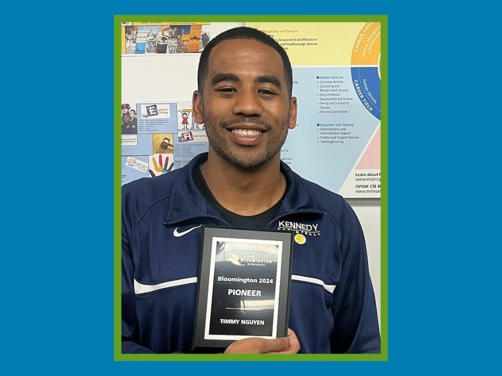 Timmy Nguyen with award plaque