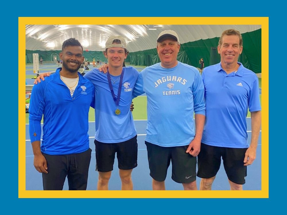 Bode Campbell and coaches after tennis section championship win