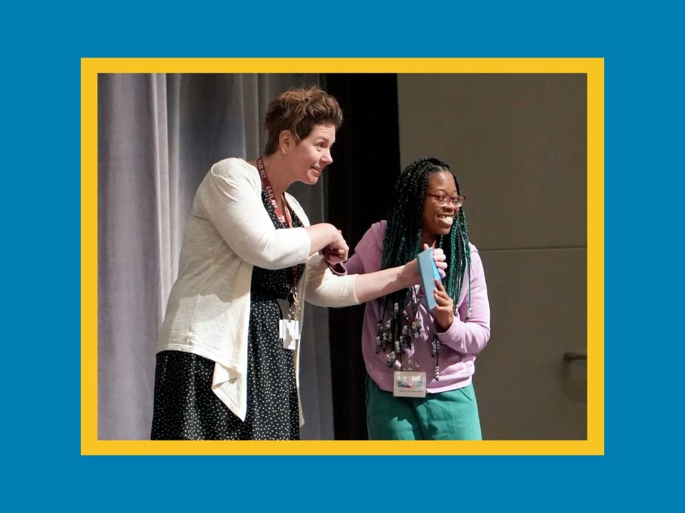 adult female student receives diploma