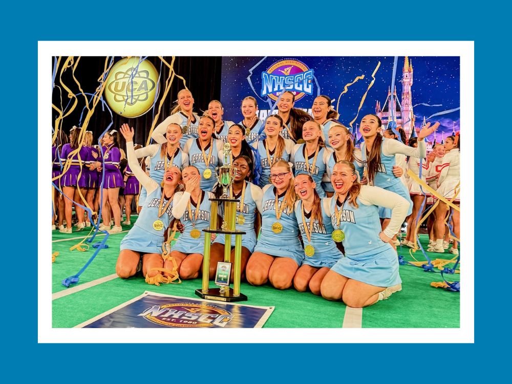cheer team with first place trophy