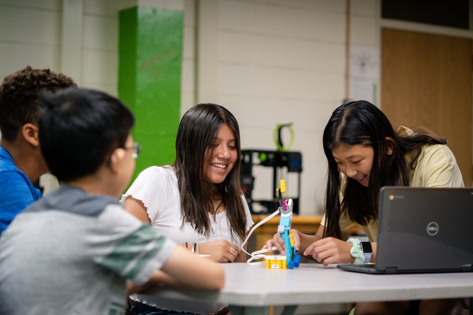 computer science students test robot