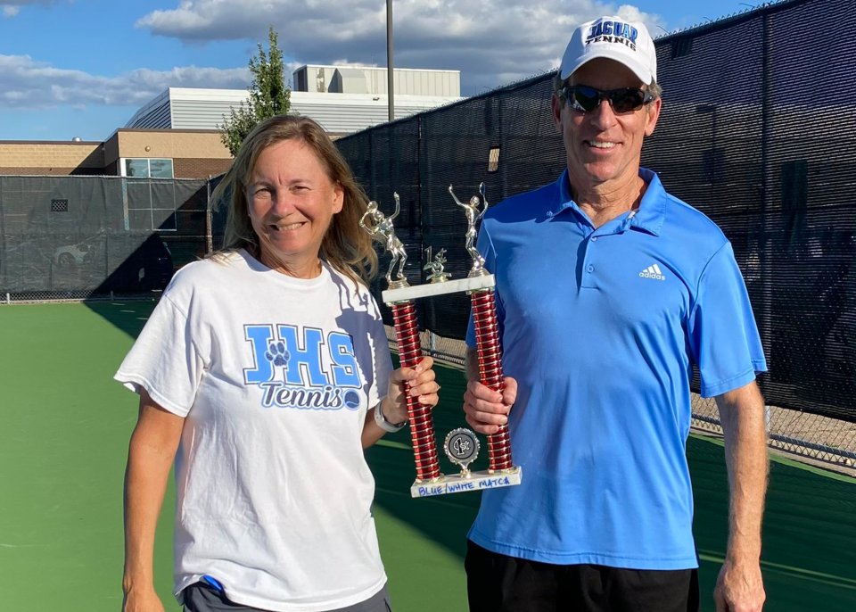 Lynn Larson and Tom McNutt holding trophy