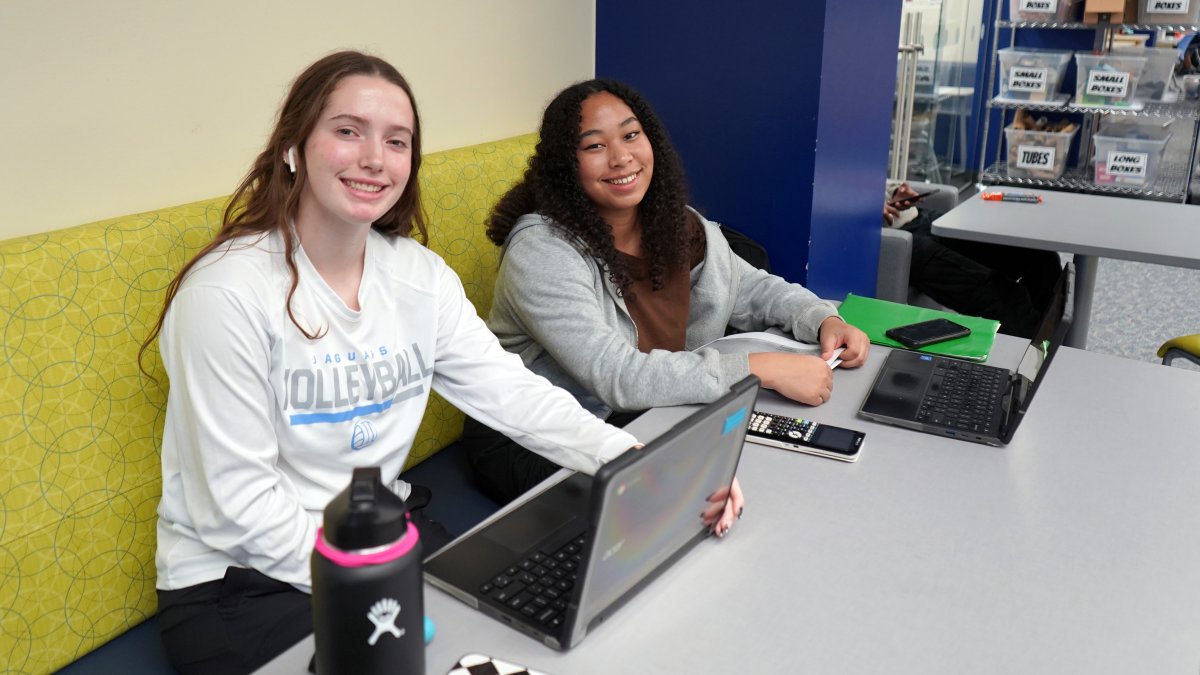 two students at table