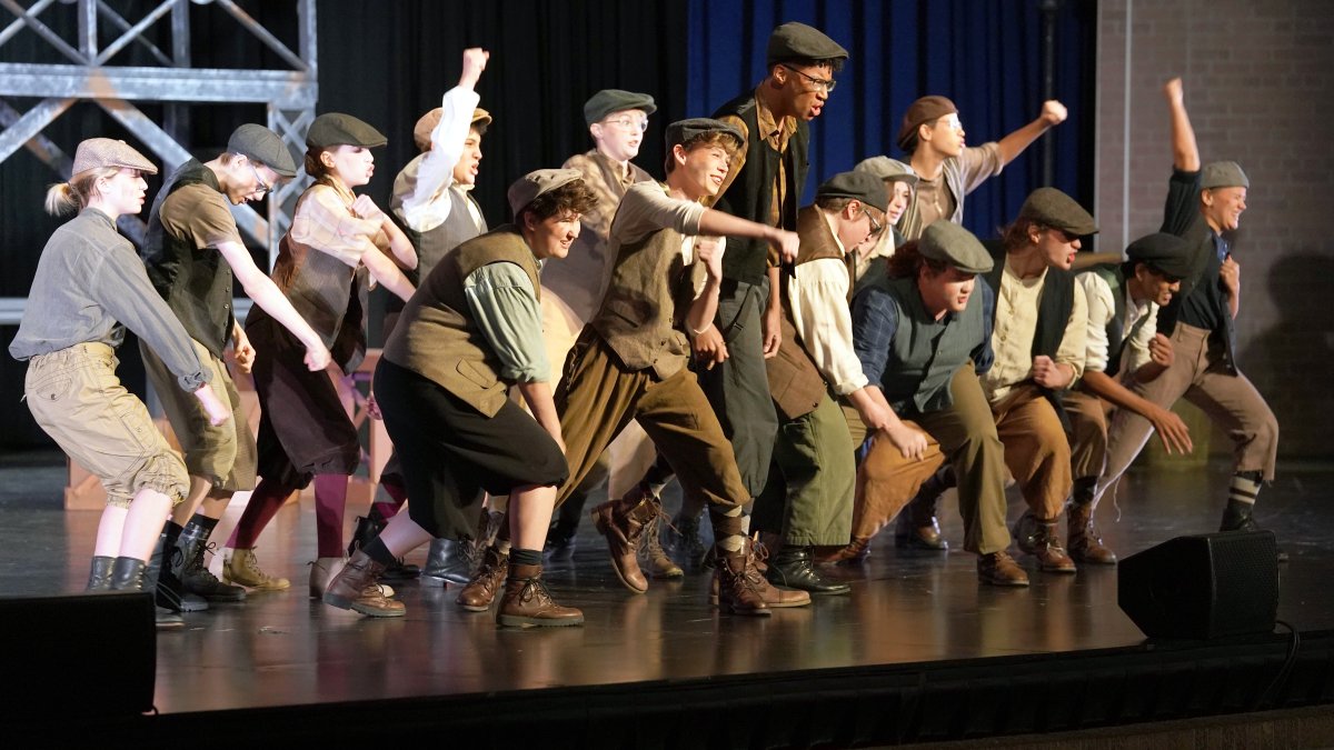 students performing in a musical