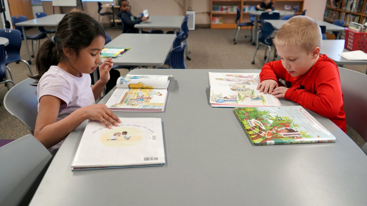 students reading books