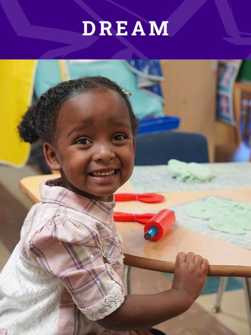 Girl smiling with Dream text