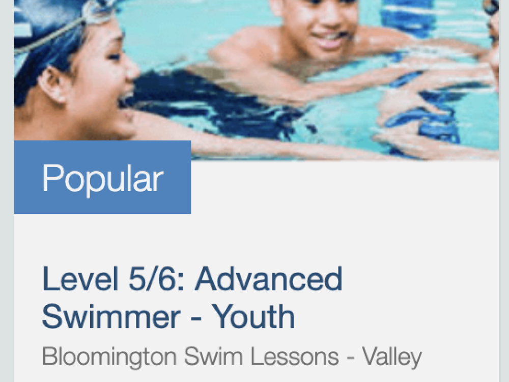 Two kids in a pool.