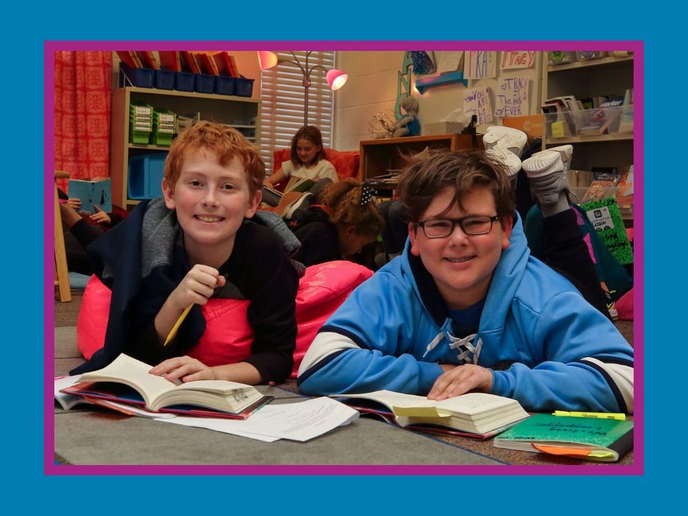 Two students reading books