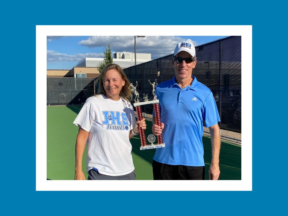 Lynn Larson and Tom McNutt holding trophy